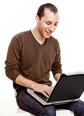 Image showing Working with a laptop