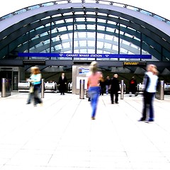 Image showing People walking to the tube station, London