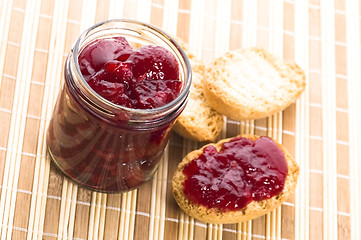 Image showing Breakfast of cherry jam on toast