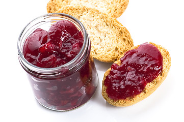 Image showing Breakfast of cherry jam on toast