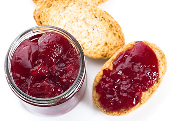 Image showing Breakfast of cherry jam on toast