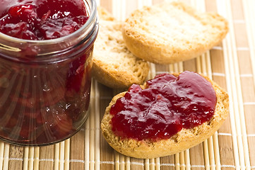 Image showing Breakfast of cherry jam on toast