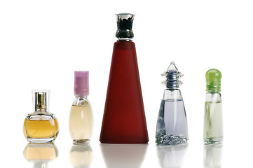 Image showing Multi-coloured bottles with perfumery