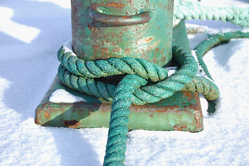 Image showing Green Rope Knotted Around a Bollard