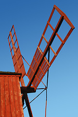 Image showing Fragment of Red Wooden Windmill