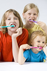 Image showing Children brushing teeth