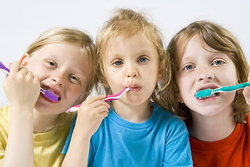 Image showing Children brushing teeth