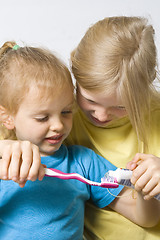 Image showing Children brushing teeth