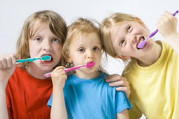 Image showing Children brushing teeth