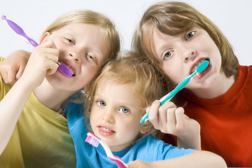 Image showing Children brushing teeth