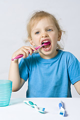 Image showing Children brushing teeth