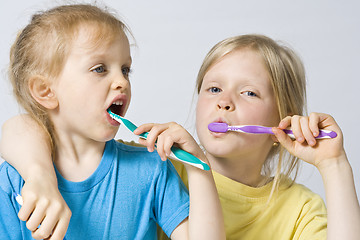 Image showing Children brushing teeth