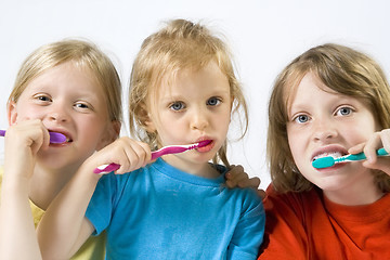 Image showing Children brushing teeth