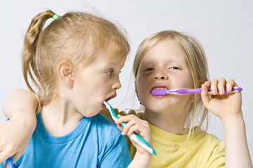 Image showing Children brushing teeth