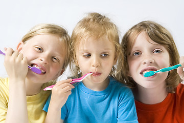 Image showing Children brushing teeth