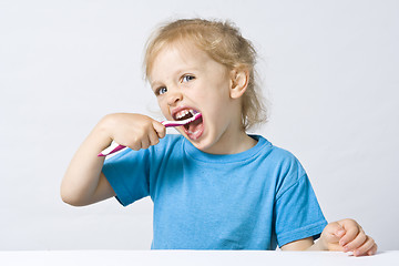 Image showing Children brushing teeth