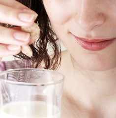 Image showing Young people eating milk with cereals