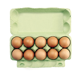 Image showing eggs in a carton isolated on white