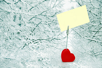 Image showing Heart holder with white paper over winter background