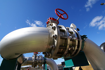 Image showing Pipes, tubes, machinery and steam turbine at a power plant