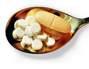 Image showing Pills on a teaspoon 