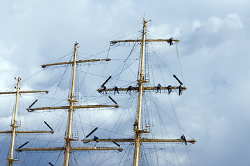 Image showing Climbing sailors