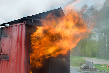 Image showing Container fire blazing