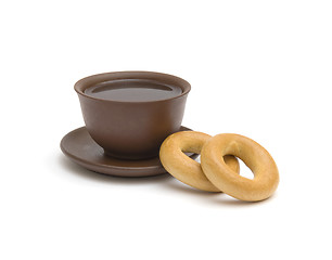 Image showing The cup of tea and donuts