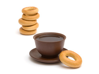 Image showing The cup of tea and donuts
