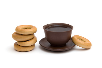 Image showing The cup of tea and donuts