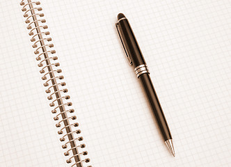 Image showing The notebook and pen