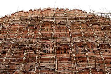 Image showing Hawa Mahal (Palace Of Winds) surrounded by scaffolds in Jaipur, 