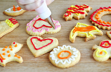 Image showing Decorating cookies