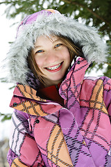 Image showing Happy winter girl in ski jacket