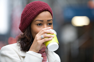 Image showing Woman Drinking a Hot Beverage