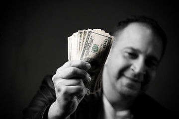 Image showing Man Holding Cash