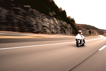 Image showing Speeding Motorcycle Woman