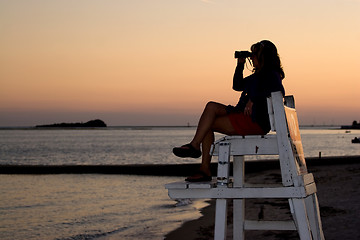 Image showing Woman With Binoculars