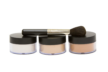 Image showing Make-up powder jars with brush isolated