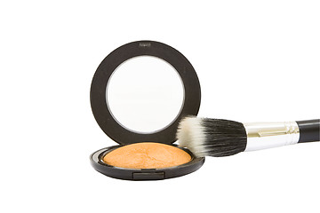 Image showing Make-up powder compact with brush isolated