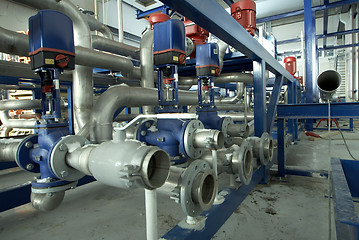 Image showing Equipment, cables and piping as found inside of a modern industr