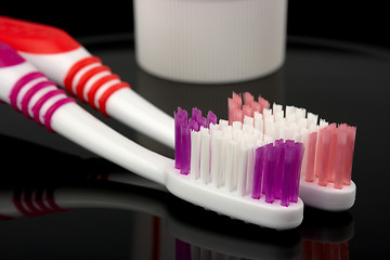 Image showing Two toothbrushes and toothpaste