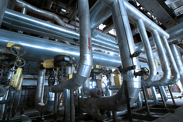 Image showing Pipes, tubes, machinery and steam turbine at a power plant
