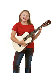 Image showing girl playing guitar on white