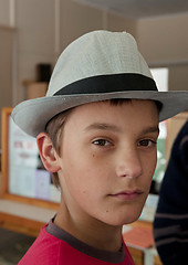 Image showing trying the hat