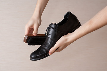 Image showing Polishing footwear