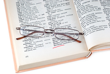 Image showing The dictionary and spectacles