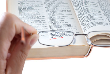 Image showing The dictionary and spectacles