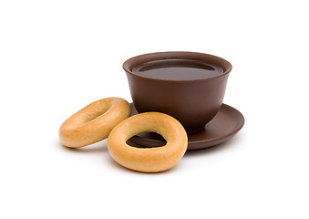 Image showing The cup of tea and donuts