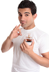 Image showing Man recommending promoting a perfume